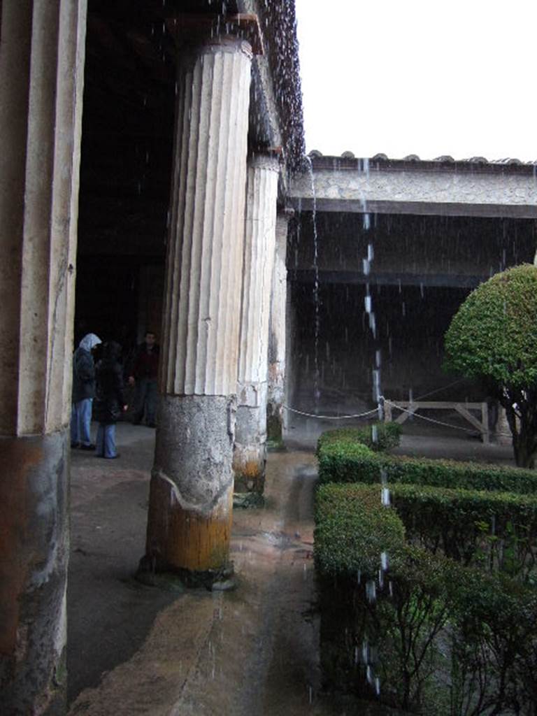 II.3.3 Pompeii. December 2005. Room 11, north portico, looking east. 
Rainwater gutter in use