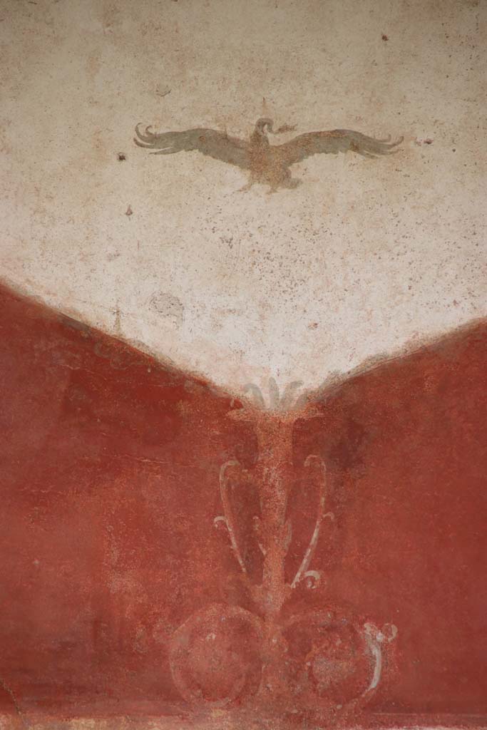 II.3.3 Pompeii. September 2017. 
Room 11, west portico, detail of painted decoration above doorway to room 13, cubiculum.
Photo courtesy of Klaus Heese.