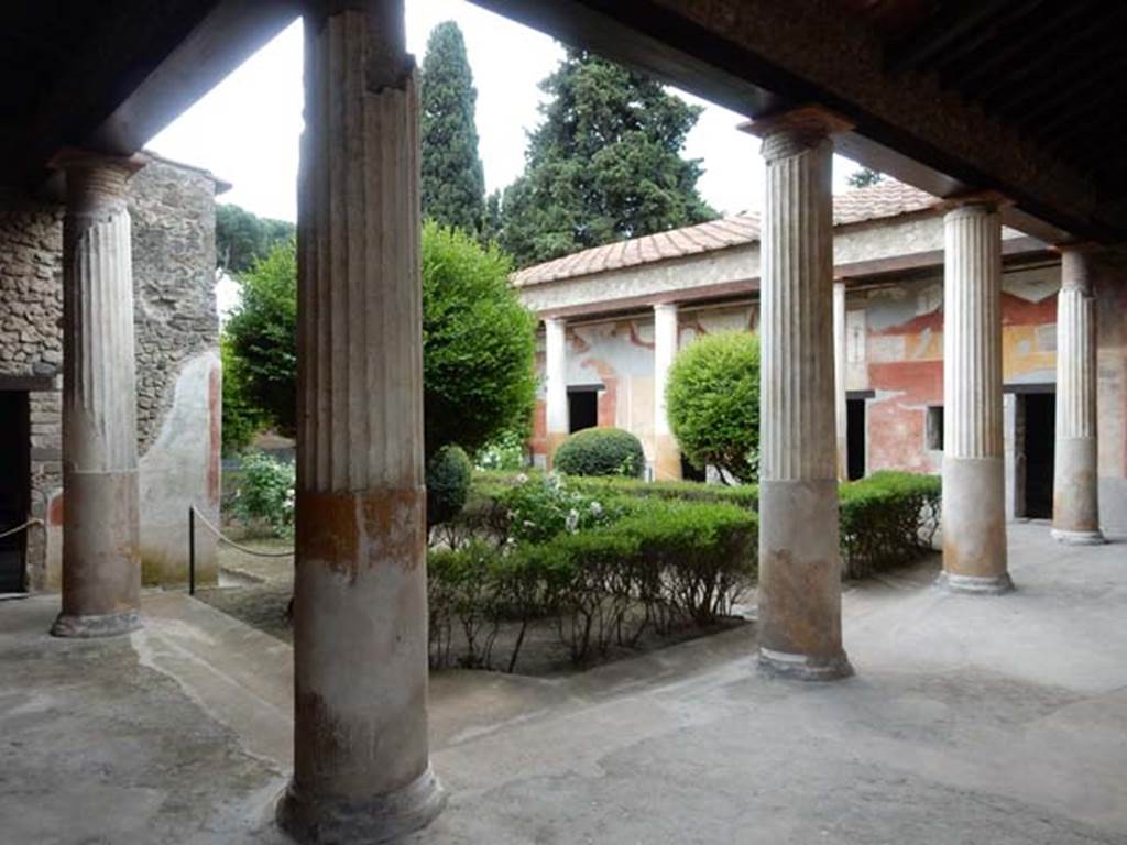 II.3.3 Pompeii. May 2016. Room 11, looking towards west portico, across north portico and peristyle garden.  Photo courtesy of Buzz Ferebee.