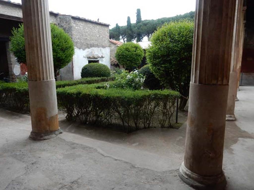 II.3.3 Pompeii. May 2016.  Room 11, north portico. Looking south-east across garden area from near doorway to room 5. Photo courtesy of Buzz Ferebee.