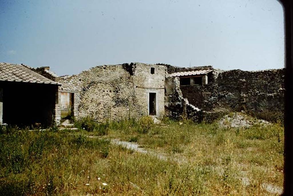 II.3.6  Pompeii. 1959. Looking north-east to rear of house of II.3.4. Photo by Stanley A. Jashemski.
Source: The Wilhelmina and Stanley A. Jashemski archive in the University of Maryland Library, Special Collections (See collection page) and made available under the Creative Commons Attribution-Non Commercial License v.4. See Licence and use details.
J59f0154