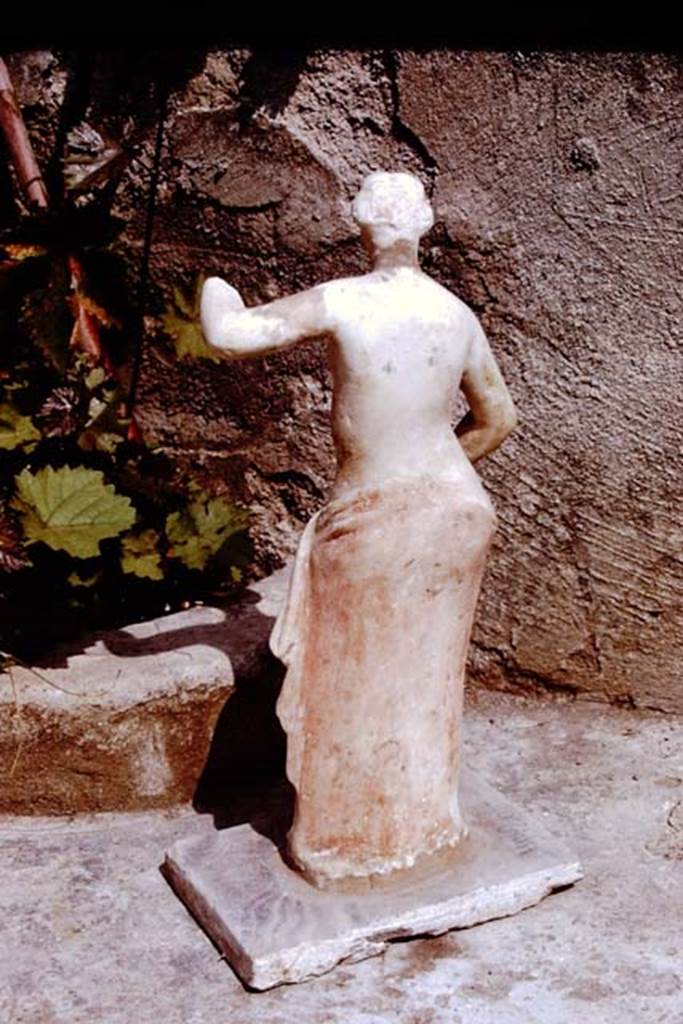 II.3.6 Pompeii. 1972. White marble statue of Venus, still with traces of red colouring.
Found in 1953. SAP inventory number: 9926. Photo by Stanley A. Jashemski. 
Source: The Wilhelmina and Stanley A. Jashemski archive in the University of Maryland Library, Special Collections (See collection page) and made available under the Creative Commons Attribution-Non Commercial License v.4. See Licence and use details.
J72f0304