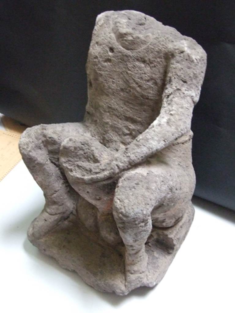 II.3.6 Pompeii.  March 2009.    Headless ithyphallic tufa statuette from the garden. Found in 1953.    SAP inventory number: 10017