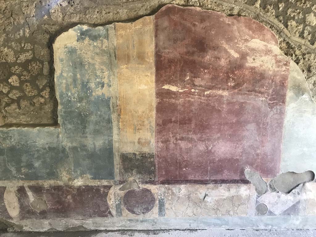 II.4.3 Pompeii. April 2019. Detail of painted decoration on west wall of atrium. 
Photo courtesy of Rick Bauer.