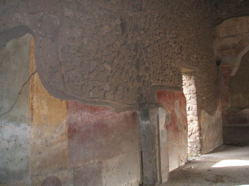 II.4.3 Pompeii. December 2004. Atrium east wall and doorway to II.4.4.