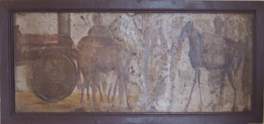 II.4.3 Pompeii. Part of the “Forum Frieze” found in the atrium.  
On the left part is the arrival from the countryside of a cart pulled by a mule and an ass carrying a load.  
On the right part is three men with another donkey with a saddle.
Now in Naples Archaeological Museum.  Inventory number 9057.
See Accademici Ercolanesi, 1762. Le Pitture Antiche d’Ercolano: Tome III. (p.227, Tav. 43).