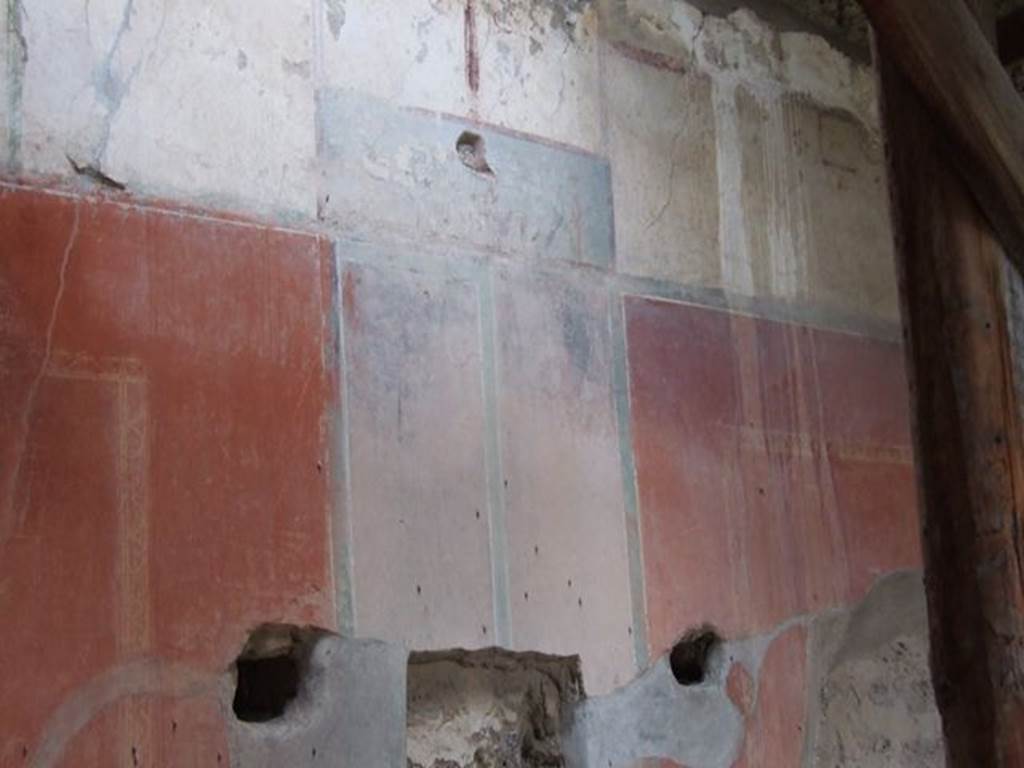 II.4.6 Pompeii. December 2006. Detail of wall decoration on north end of east wall.
According to PPM, the dark blue monochrome square topped by candelabrum, present in the upper white area, is a representation of a sacred landscape. 
See Carratelli, G. P., 1990-2003. Pompei: Pitture e Mosaici: Vol. III.  Roma: Istituto della enciclopedia italiana, p. 209.