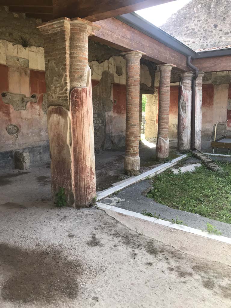 II.4.6 Pompeii. April 2019. 
Looking towards the east side and south-east corner of the portico of the baths, from entrance doorway.
Photo courtesy of Rick Bauer