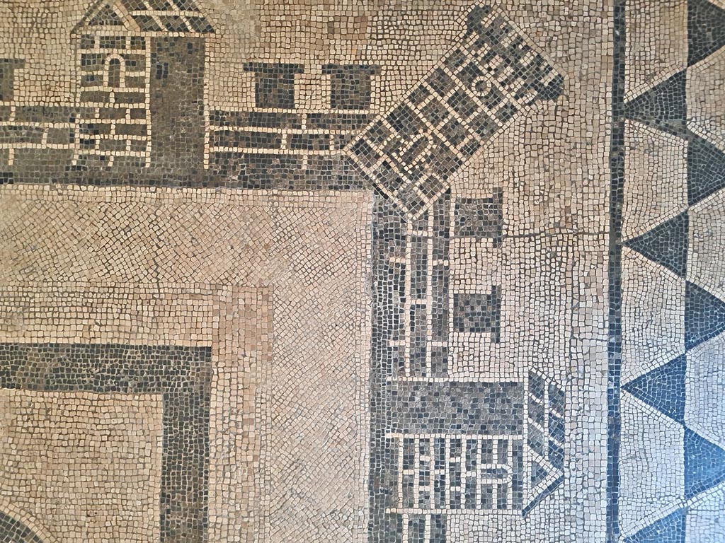II.4.6 Pompeii. June 2024. Detail of corner of border edging of mosaic in atrium, now in room CXXXII (132). 
On display in Naples Archaeological Museum. Photo courtesy of Giuseppe Ciaramella.