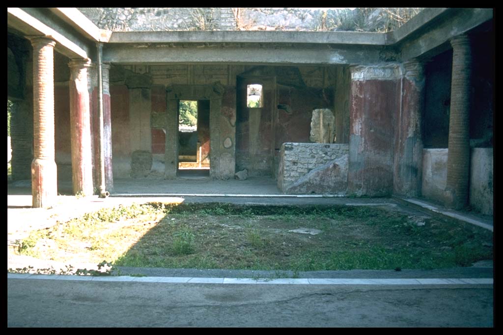 II.4.6 Pompeii. Looking south across portico of the baths.
Photographed 1970-79 by Günther Einhorn, picture courtesy of his son Ralf Einhorn.