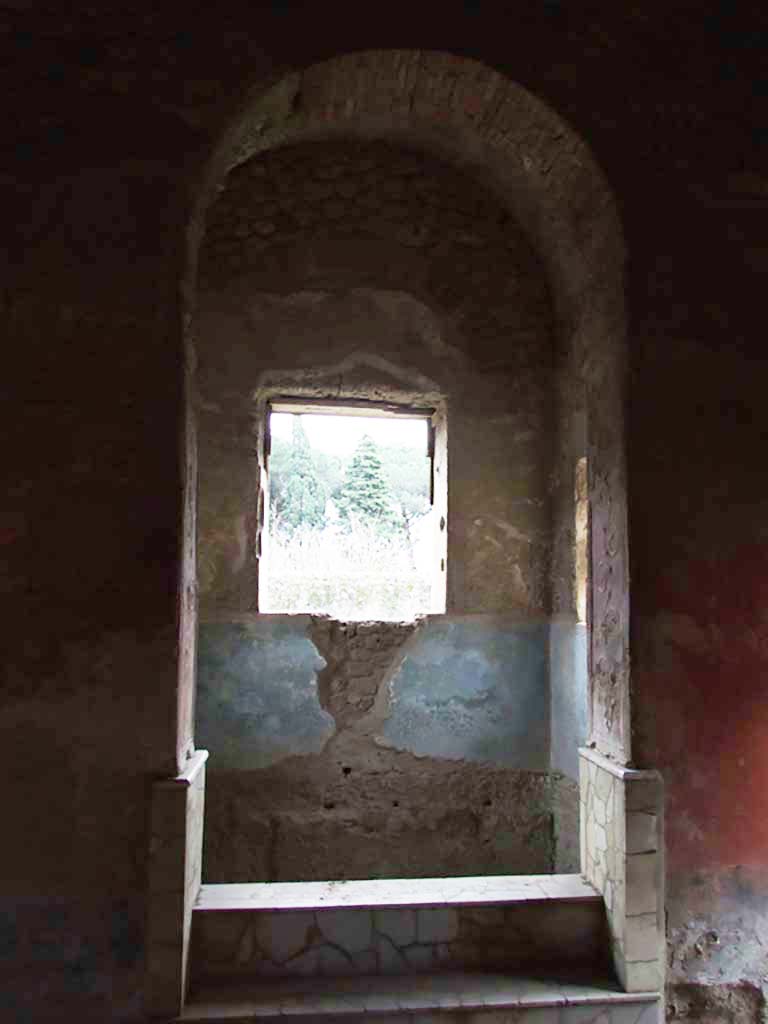 II.4.6 Pompeii. December 2006. 
Frigidarium/apodyterium, looking south towards the basin/pool with three windows.