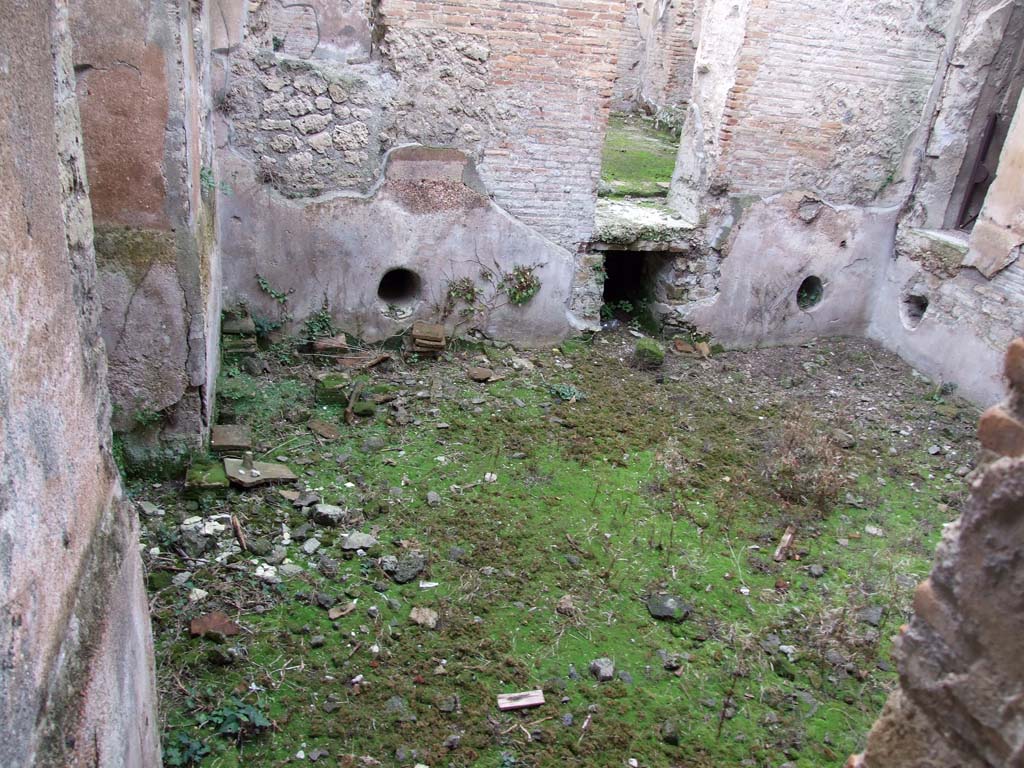 II.4.6 Pompeii. December 2006. 
Tepidarium, looking towards west wall, with doorway to caldarium, centre right, and to laconicum in north wall, on extreme right.