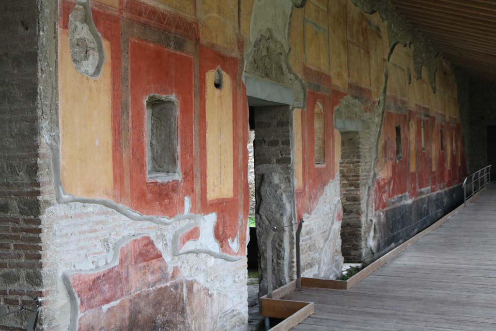 II.4.6 Pompeii. December 2018. 
Looking north along west wall of portico from doorway on north side of summer triclinium. Photo courtesy of Aude Durand.