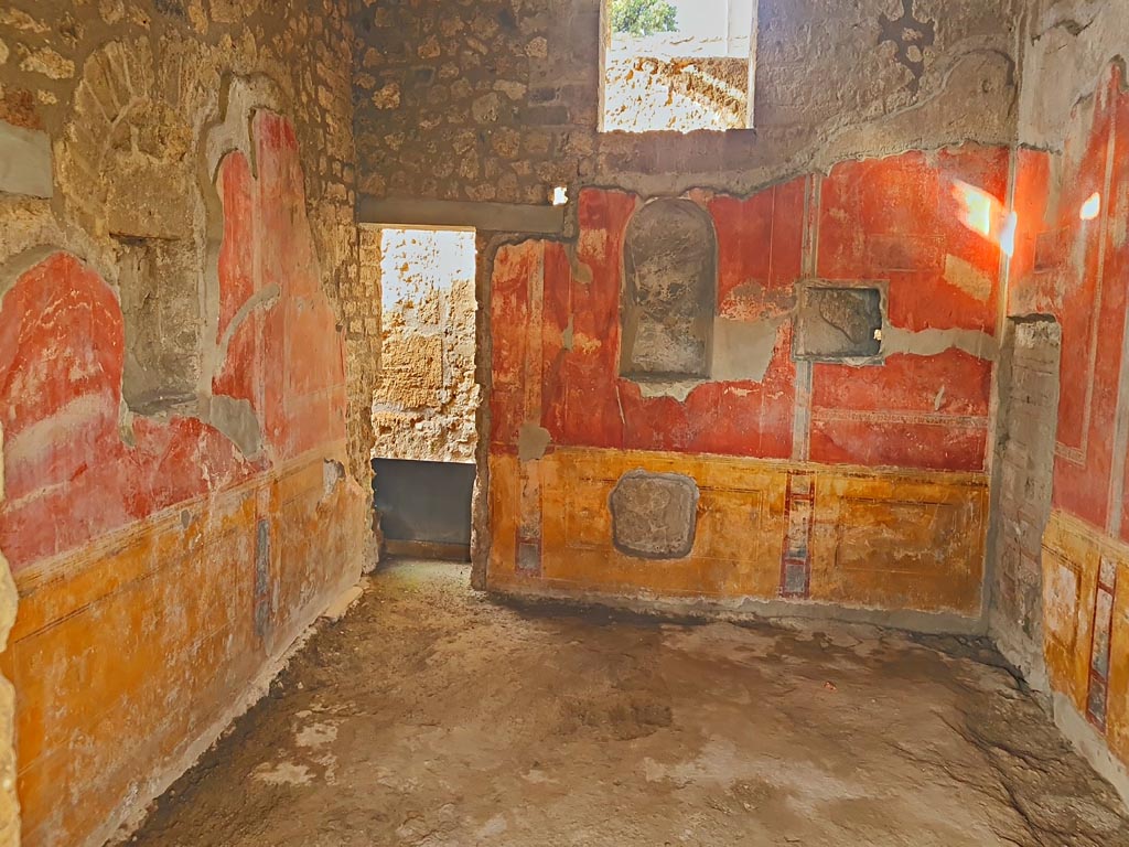 II.4.6 Pompeii. March 2024. 
Looking towards south-west corner, and doorway to rear corridor, in room at south end of west portico. Photo courtesy of Giuseppe Ciaramella.