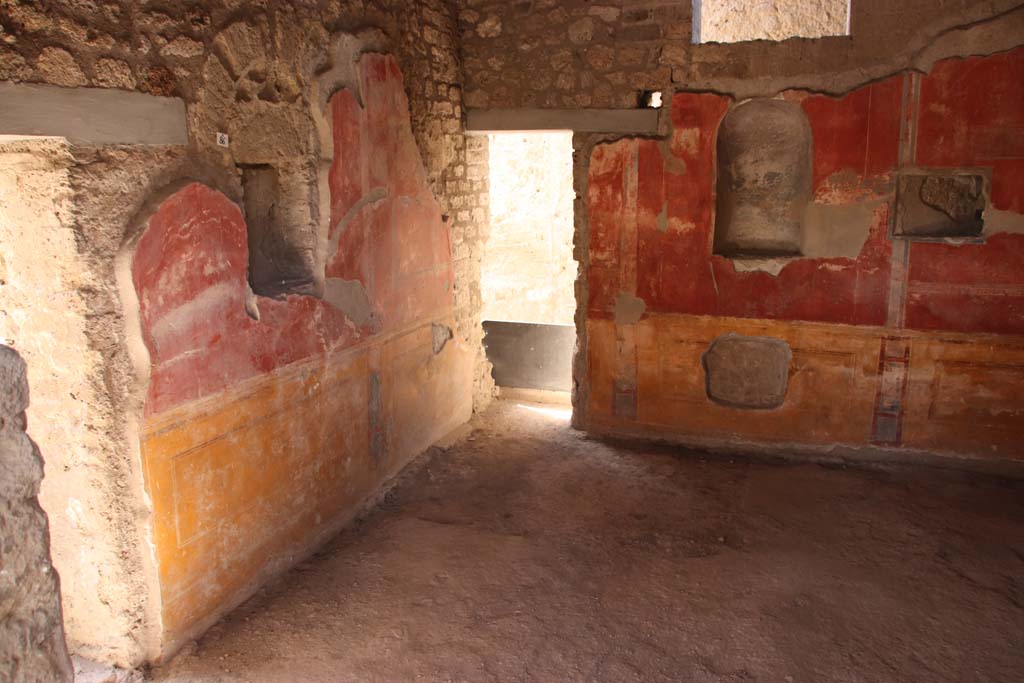 II.4.6 Pompeii. September 2019. 
Looking towards south wall, and doorway to rear corridor in south-west corner, in room at south end of west portico. 
Photo courtesy of Klaus Heese.