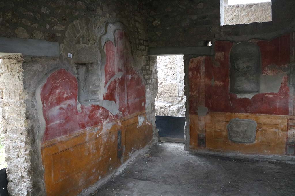 II.4.6 Pompeii. December 2018.  
Looking towards south wall, and doorway to rear corridor in south-west corner, in room at south end of west portico. 
Photo courtesy of Aude Durand.