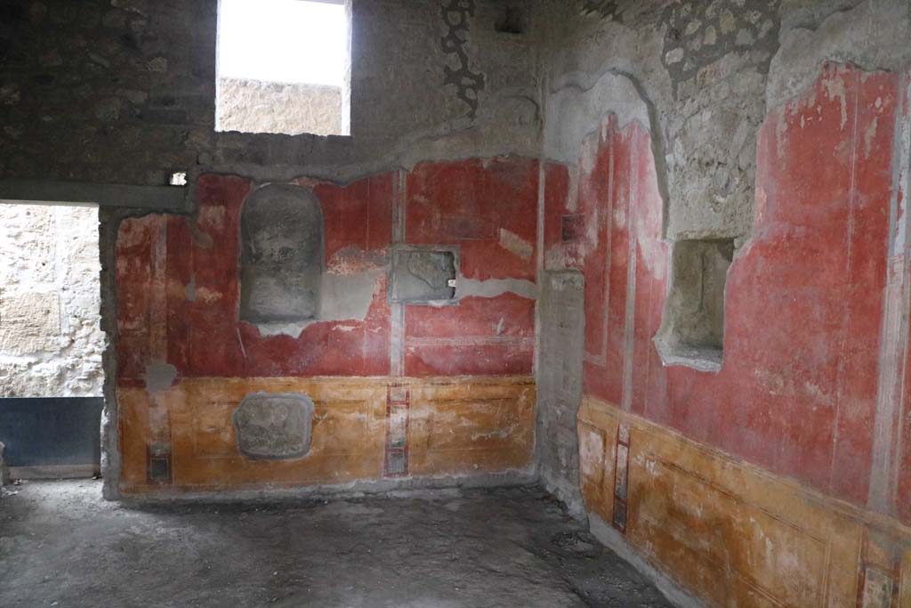 II.4.6 Pompeii. December 2018.  
Looking towards west wall, north-west corner and north wall of room at south end of portico. Photo courtesy of Aude Durand.