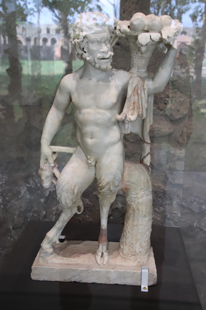 II.4.2/6 Pompeii. October 2022. 
Statuette of marble Pan with the head of an animal, found in garden area. Photo courtesy of Klaus Heese
