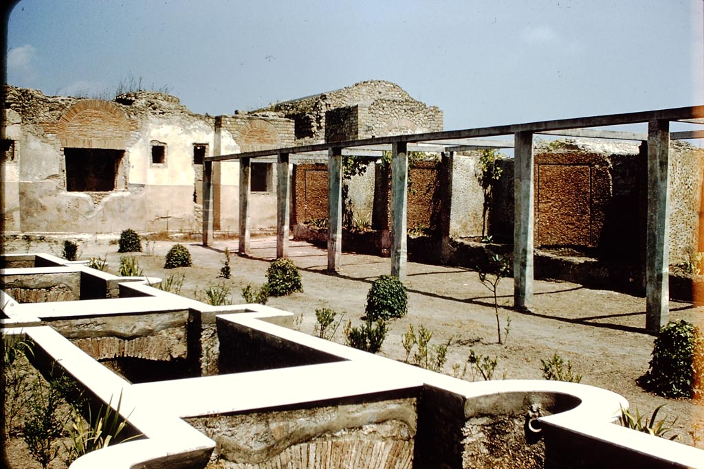II.4.6 Pompeii. 1959. Looking north-east from euripus, or water feature. Photo by Stanley A. Jashemski.
Source: The Wilhelmina and Stanley A. Jashemski archive in the University of Maryland Library, Special Collections (See collection page) and made available under the Creative Commons Attribution-Non-Commercial License v.4. See Licence and use details.
J59f0152