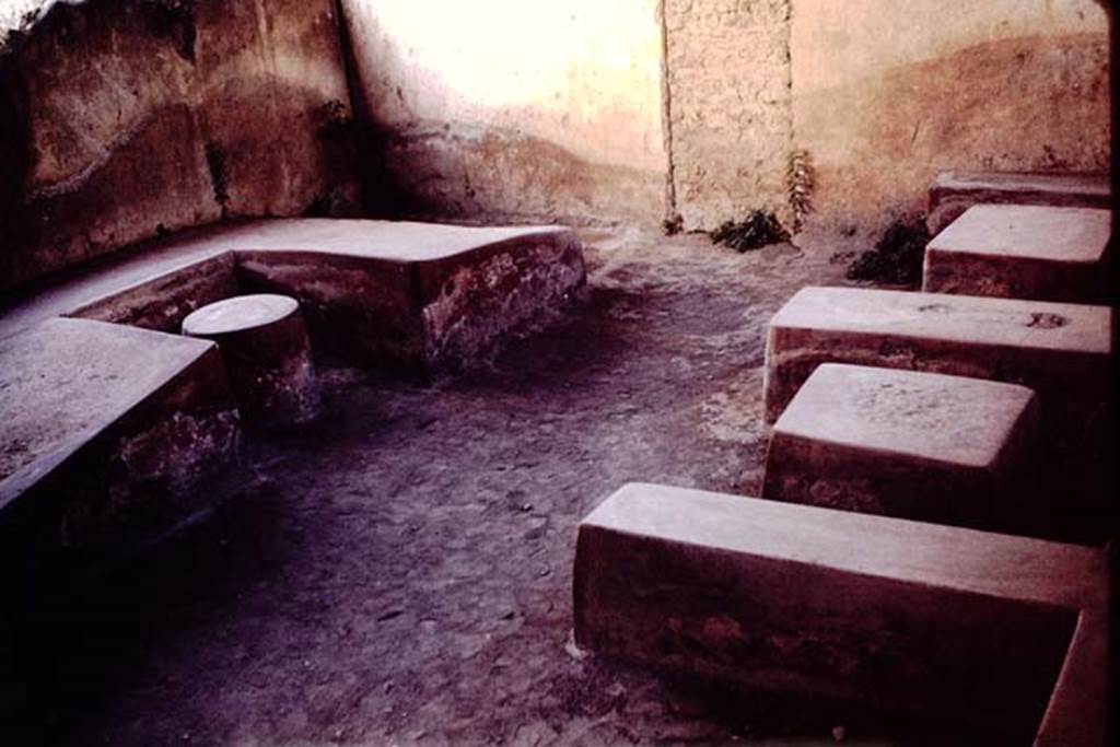 II.4.7 Pompeii. 1964. Triclinium and round table, together with other tables and seats in compartments. Photo by Stanley A. Jashemski.
Source: The Wilhelmina and Stanley A. Jashemski archive in the University of Maryland Library, Special Collections (See collection page) and made available under the Creative Commons Attribution-Non Commercial License v.4. See Licence and use details.
J64f1945
