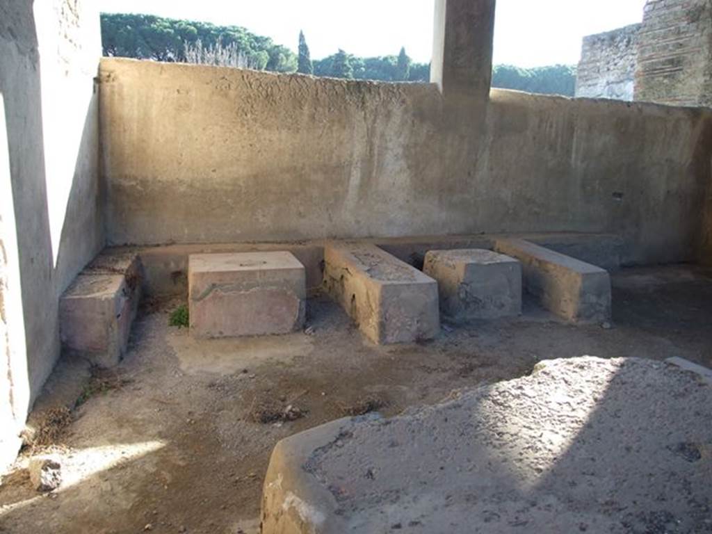 II.4.7 Pompeii. December 2006. Stone seats and tables in compartments.