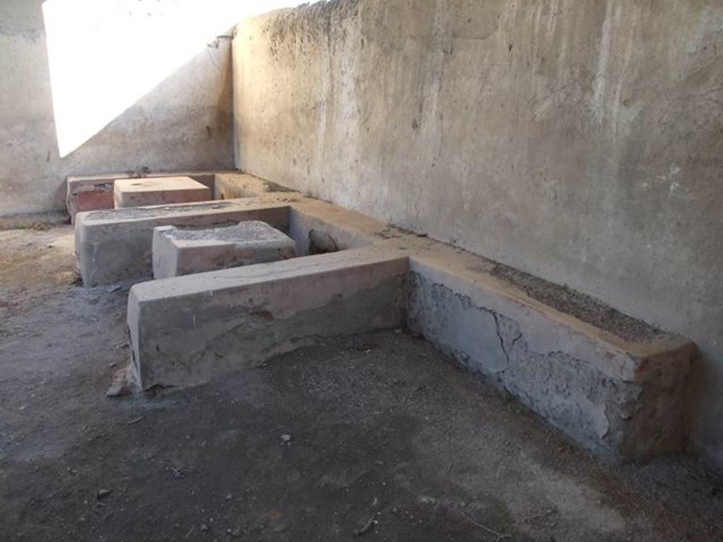 II.4.7 Pompeii. December 2006.  Stone seats and tables in compartments.