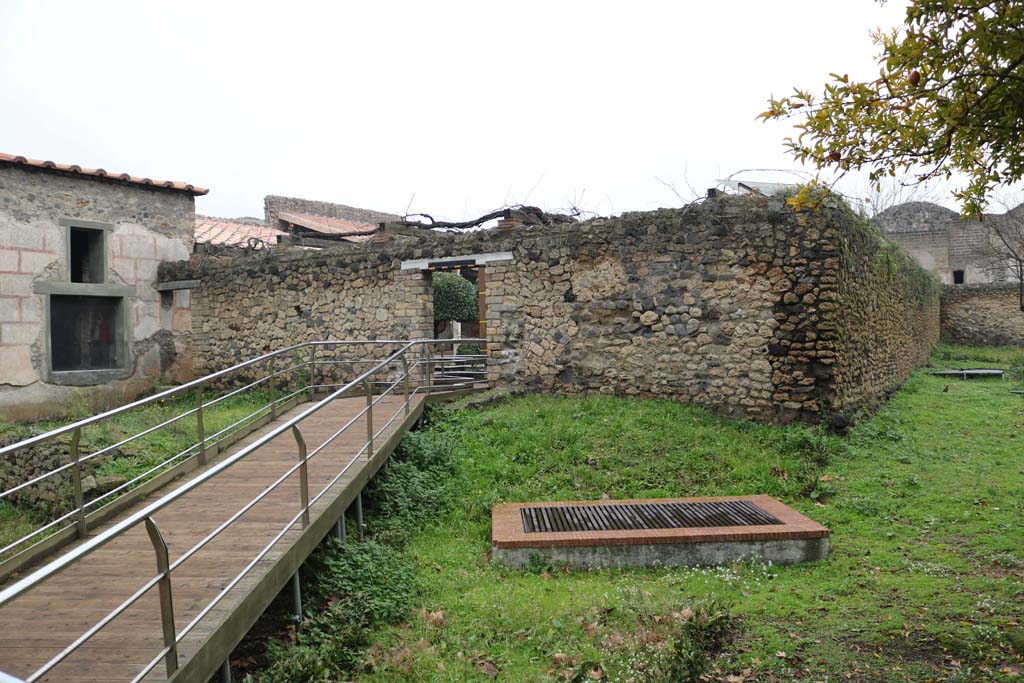 II.4.9 Pompeii. December 2018. 
Looking north to doorway in south wall of garden area, leading to II.4.6 and II.4.10. Photo courtesy of Aude Durand.