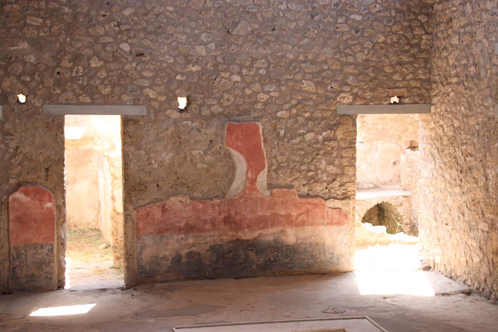 II.4.10 Pompeii. September 2019. Looking towards south side of atrium, with kitchen doorway, on right.  
Photo courtesy of Klaus Heese.