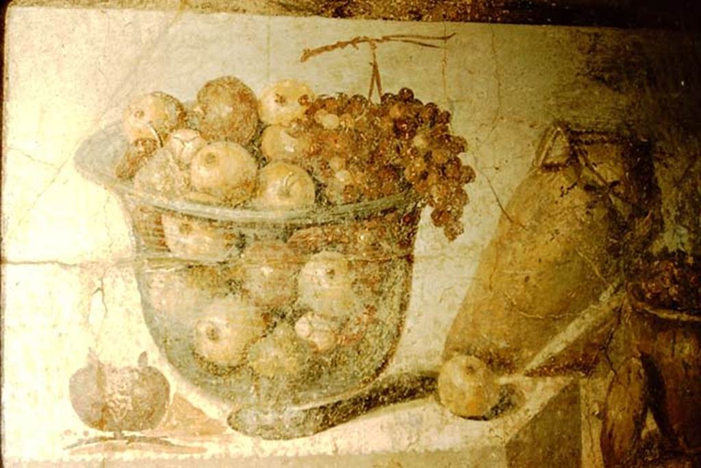II.4.10 Pompeii. 1957. Frieze from north wall of tablinum, crater of glass full of fruits, and terracotta pots, Now in Naples Archaeological Museum.  Inventory number 8611.
Photo by Stanley A. Jashemski.
Source: The Wilhelmina and Stanley A. Jashemski archive in the University of Maryland Library, Special Collections (See collection page) and made available under the Creative Commons Attribution-Non Commercial License v.4. See Licence and use details. J57f0550