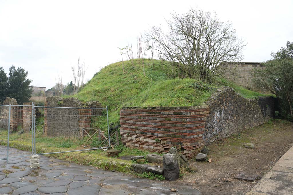 II.5.1 Pompeii, centre left. December 2018. 
Looking east from junction with Vicolo del Anfiteatro, towards entrance doorway on north-west corner of insula II.5. Photo courtesy of Aude Durand.
