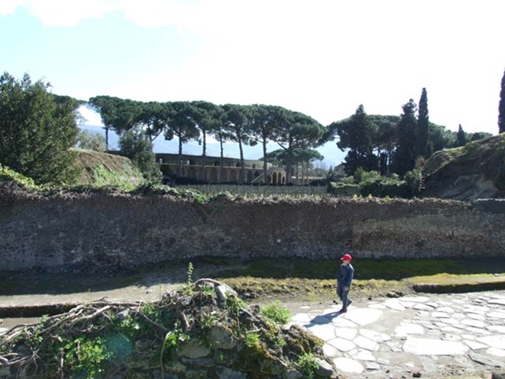 II.5.4 Pompeii.  March 2009. Looking south towards wall on Via dell’Abbondanza.