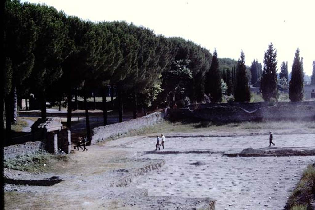 II.5 Pompeii, 1968.  Workers going home, looking west across south side of site. Photo by Stanley A. Jashemski.
Source: The Wilhelmina and Stanley A. Jashemski archive in the University of Maryland Library, Special Collections (See collection page) and made available under the Creative Commons Attribution-Non Commercial License v.4. See Licence and use details.
J68f0775