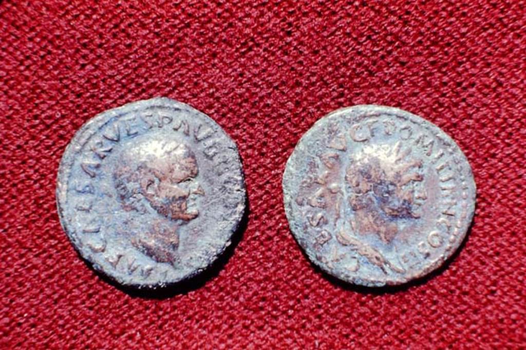 II.5 Pompeii, 1968. Detail of coins.  Photo by Stanley A. Jashemski.
Source: The Wilhelmina and Stanley A. Jashemski archive in the University of Maryland Library, Special Collections (See collection page) and made available under the Creative Commons Attribution-Non Commercial License v.4. See Licence and use details.
J68f1787