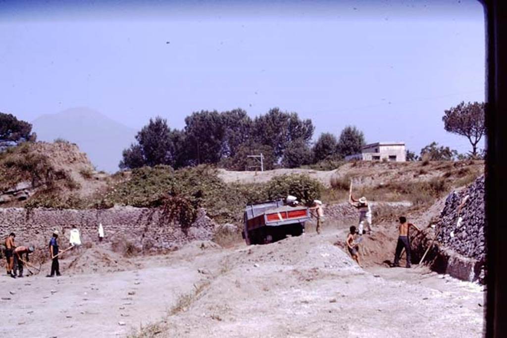 II.5 Pompeii. 1970. Working near north wall of site.  Photo by Stanley A. Jashemski.
Source: The Wilhelmina and Stanley A. Jashemski archive in the University of Maryland Library, Special Collections (See collection page) and made available under the Creative Commons Attribution-Non Commercial License v.4. See Licence and use details.
J70f0543