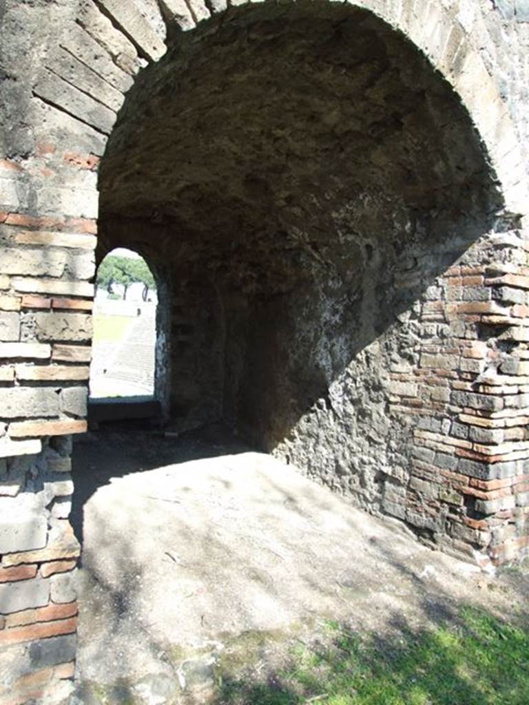 II.6 Pompeii. March 2009.  Arched passageway leading through to upper seating of the Amphitheatre.
