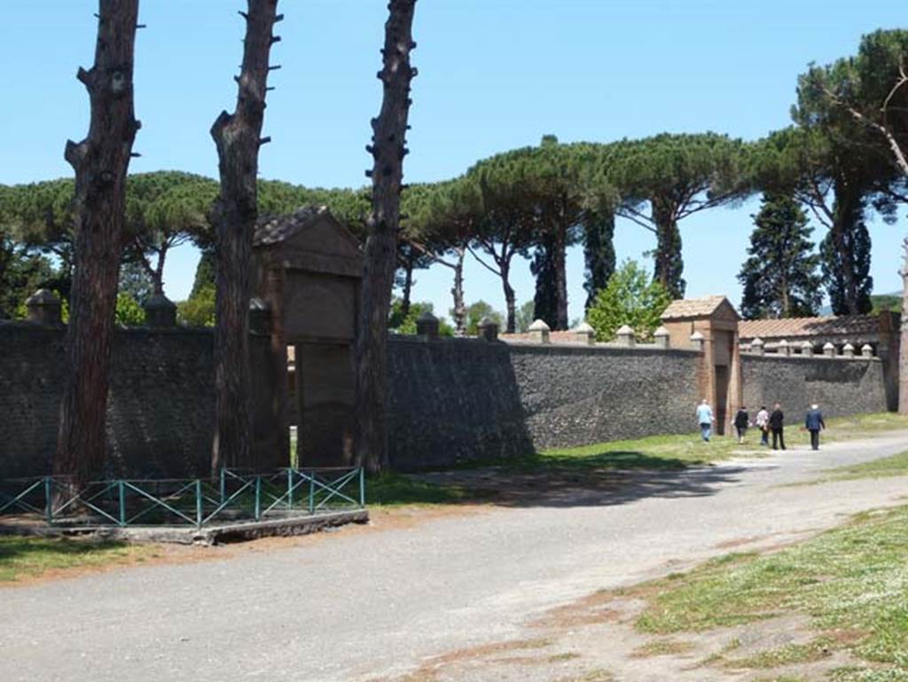 II.7.3 Pompeii. Palaestra. May 2012. Looking north along wall. 
Entrance II.7.3 is on the left, and II.7.4, to the right. 
Photo courtesy of Buzz Ferebee.