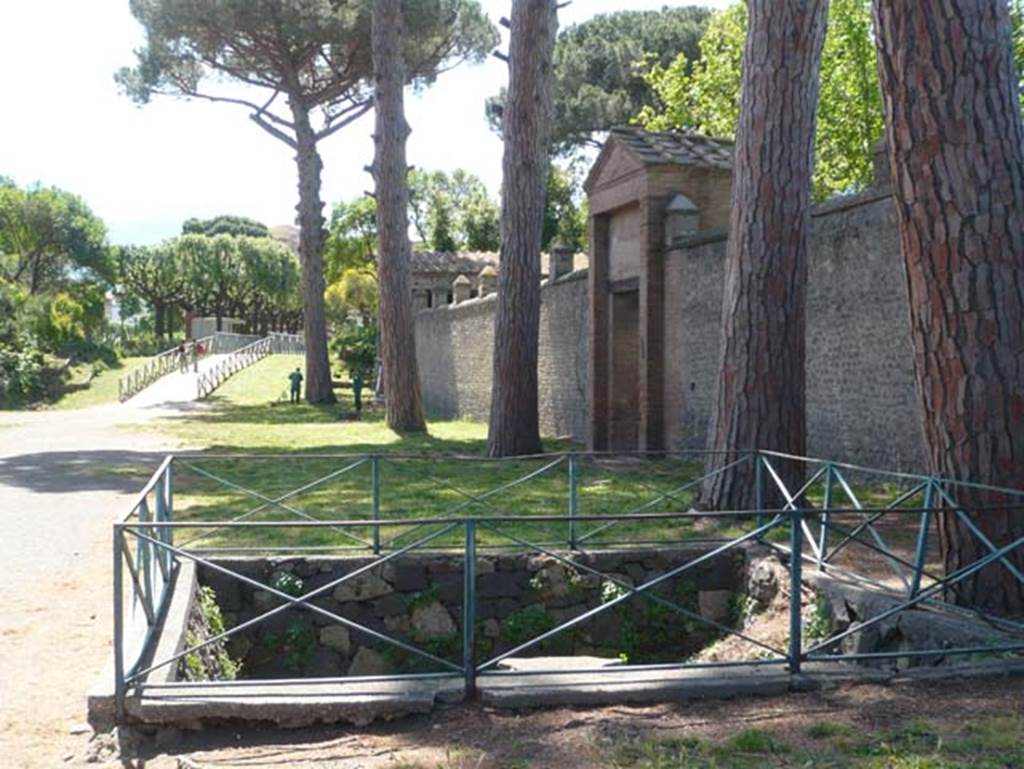 II.7.3 Pompeii. Palaestra. May 2012. Looking south along wall from near II.7.3, with entrance to II.7.2, centre right.  Photo courtesy of Buzz Ferebee.