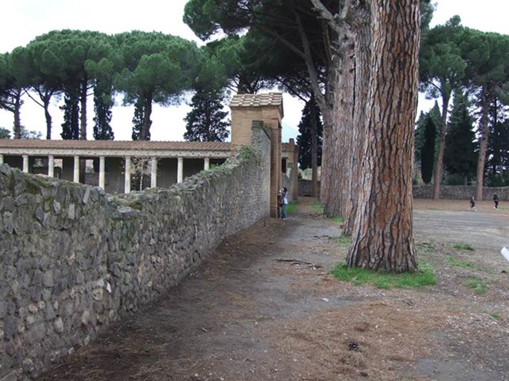 II.7.3 Pompeii. December 2006. Looking north along exterior wall from II.7.3 to II.7.4.