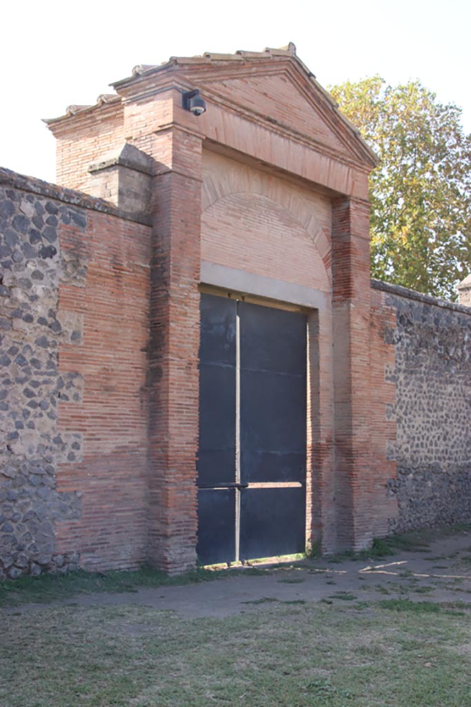 II.7.4 Pompeii. Palaestra. October 2023. 
Looking west to entrance doorway. Photo courtesy of Klaus Heese.