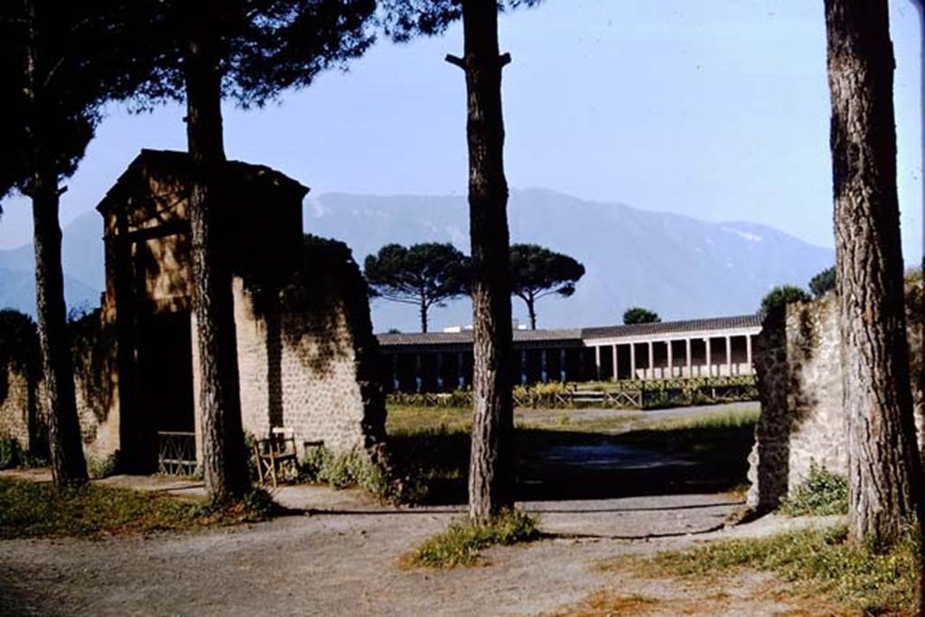 II.7.4, on left, Pompeii. 1964. Entrance through wall at side of II.7.4. Photo by Stanley A. Jashemski.
Source: The Wilhelmina and Stanley A. Jashemski archive in the University of Maryland Library, Special Collections (See collection page) and made available under the Creative Commons Attribution-Non Commercial License v.4. See Licence and use details.
J64f1453