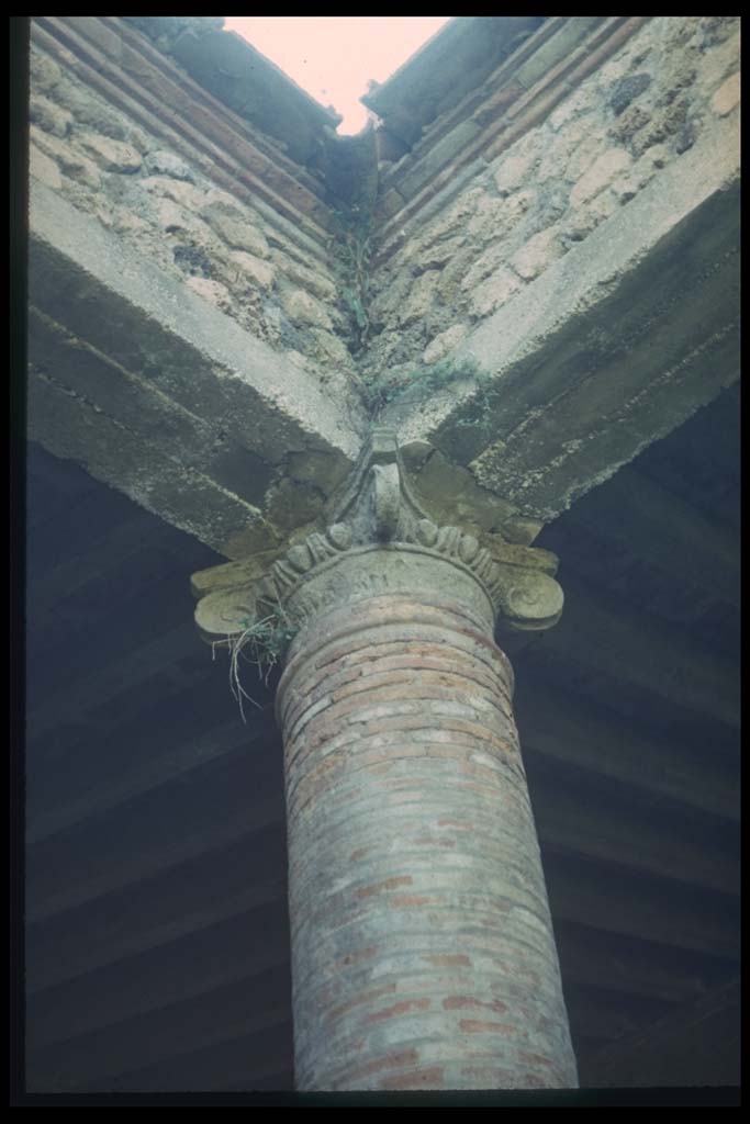 II.7.8 Pompeii. Palaestra. Corner column, capital and roof.
Photographed 1970-79 by Günther Einhorn, picture courtesy of his son Ralf Einhorn.