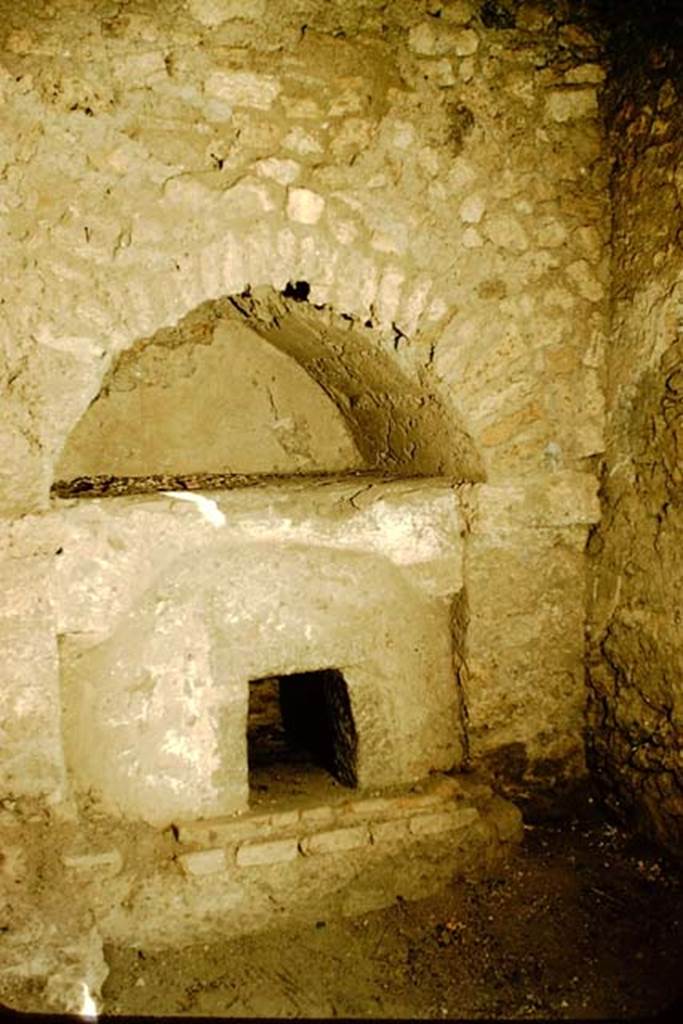 II.8.1 Pompeii. 1957. Oven against south wall of entrance room, with oven in the arch of the understairs which were reached in rear garden. Photo by Stanley A. Jashemski.
Source: The Wilhelmina and Stanley A. Jashemski archive in the University of Maryland Library, Special Collections (See collection page) and made available under the Creative Commons Attribution-Non Commercial License v.4. See Licence and use details. J57f0356