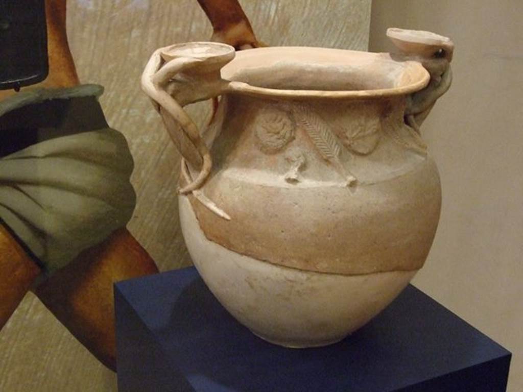 II.8.1 Pompeii. Cult Vase, SAP 10528, provenanced from “Complesso dei Riti Magici”.  Photographed at “A Day in Pompeii” exhibition at Melbourne Museum. September 2009. According to Cicirelli, the vase was found in II.8.1, and not in II.1.12 as put forward by Elia. See Cicirelli, C., Religio: feste e rituali del culto pubblico e privato, in Cibi e Sapori a Pompei e Dintorni, Exhibition Catalogue 2005. (p.35).