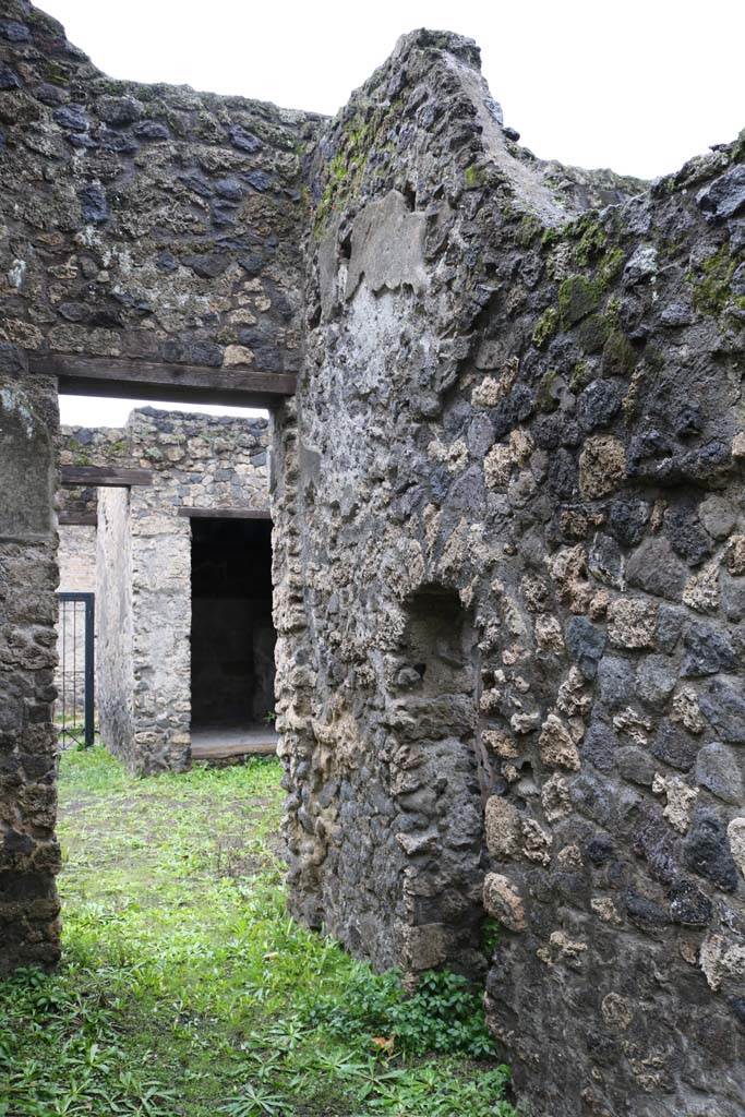 II.8.5 Pompeii. December 2018. 
Looking west to atrium from corridor leading east to rear garden. Photo courtesy of Aude Durand.