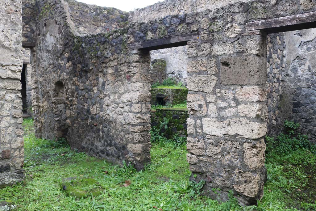 II.8.5 Pompeii. December 2018. 
Looking west to atrium along corridor with two doorways on its north side. Photo courtesy of Aude Durand.