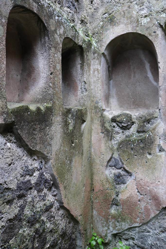 II.8.5 Pompeii. December 2018. 
Three niches in south-west corner of first room on north side of corridor. Photo courtesy of Aude Durand.
