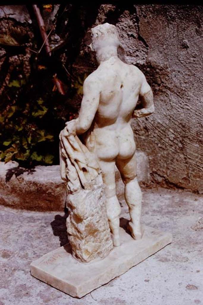 II.8.6 Pompeii. 1972. Rear of statuette of Hercules. Photo by Stanley A. Jashemski. 
Source: The Wilhelmina and Stanley A. Jashemski archive in the University of Maryland Library, Special Collections (See collection page) and made available under the Creative Commons Attribution-Non Commercial License v.4. See Licence and use details. J72f0307