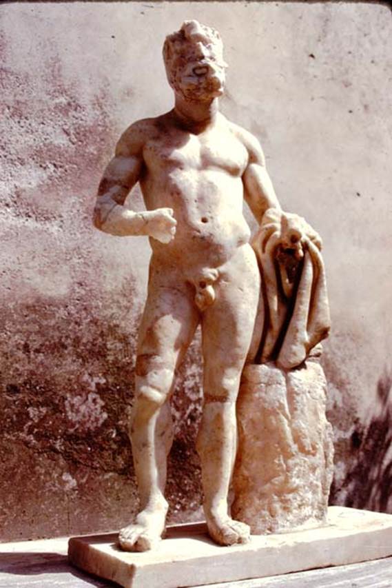 II.8.6 Pompeii. 1974. Statue of Hercules. Photo by Stanley A. Jashemski.   
Source: The Wilhelmina and Stanley A. Jashemski archive in the University of Maryland Library, Special Collections (See collection page) and made available under the Creative Commons Attribution-Non Commercial License v.4. See Licence and use details. J74f0310