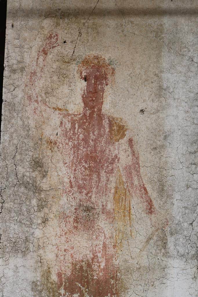 II.9.1 Pompeii.  December 2018.  
Detail of painting of Bacchus on south face of column on the north side of the triclinium 8.
Photo courtesy of Aude Durand.