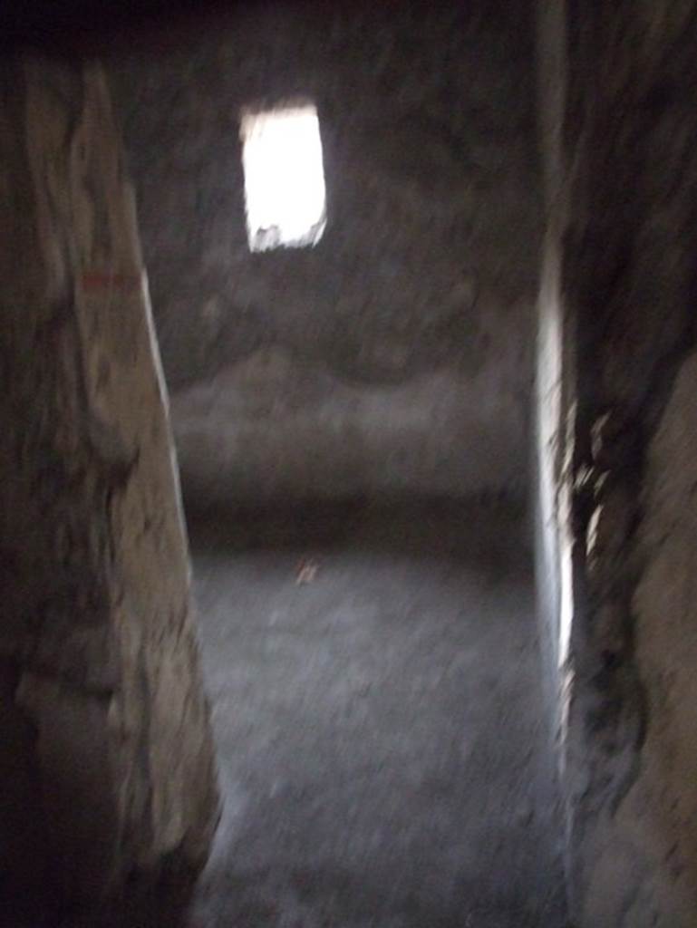 II.9.3 Pompeii. December 2007.  
Doorway to room 12 on south side of entrance. Looking towards west wall.